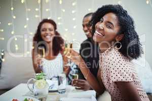 Im having such a good night out. Cropped shot of a group of young friends enjoying a night out.