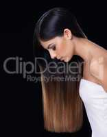 Hair and beauty unmatched. Studio shot of a beautiful brunette model with gorgeous long hair.