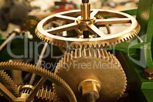 Horologists idea of a good time. Top view of toothed gears of a tower clock.