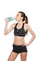 Staying hydrated. Cropped shot of a young female athlete drinking water against a white background.