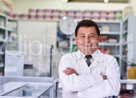 Health related expertise you can trust. Portrait of a male pharmacist in a pharmacy.