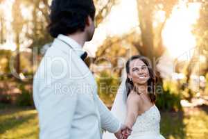 Marriage is a promise that well be together for life. Cropped shot of a young couple on their wedding day.