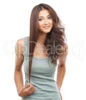 Straight or curly. A young woman with one half of her hair sleek and the other half straight.