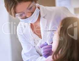 My goal is to provide exceptional care for your child. Cropped shot of a dentist examining a little girls teeth.