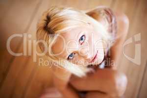 Beautiful and homely. Shot of a gorgeous young woman relaxing at home.