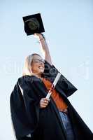 Im super proud of my achievement. Shot of a young student looking excited on graduation day.