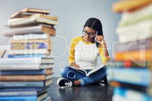 She needs to concentrate, the finals are approaching. Shot of a young female student studying at home.