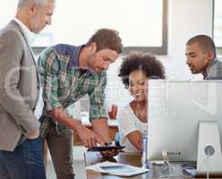 This here is an great feature. A group of coworkers working together in the office.