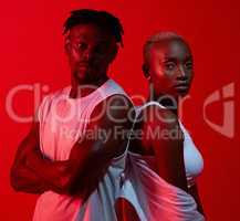Were what you need to get your brand out there. Red filtered shot of a sporty young man and woman posing together in the studio.
