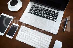 Quick and easy access to the world online. High angle shot of various digital devices on a table.