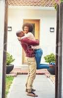 This is another big milestone for us. Shot of a young couple celebrating the move into their new house.