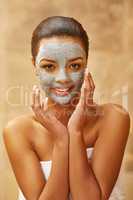 Her secret to beautiful skin. Cropped shot of a young woman enjoying a skincare treatment at the spa.
