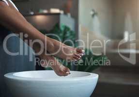 Ending off her massage with a pedicure. Closeup shot of an unrecognisable woman getting a foot treatment at a spa.