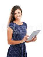 Connect to the things that make you happy. Studio portrait of an attractive young woman using a digital tablet against a white background.