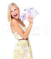 Take me shopping. Portrait of an overjoyed woman showing off a fan of european money - isolated.