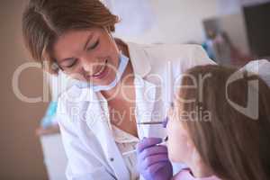 Shes highly experienced in pediatric dentistry. Cropped shot of a dentist examining a little girls teeth.