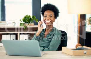 I have a great network on speed dial. Portrait of a young businesswoman talking on a cellphone in an office.