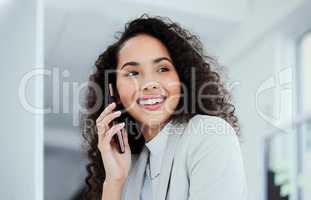 I have to run this idea by you. Shot of a young businesswoman using her smartphone to make a phone call.