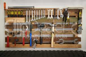 Every repairmans dream. Shot of a tools hanging on a wall.