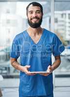 Improving clinical workflow with smart tech. Portrait of a medical practitioner using a digital tablet in a hospital.