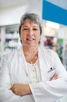 Addressing your health concerns with professionalism and expertise. Portrait of a confident mature woman working in a pharmacy.