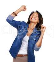 Shes on cloud nine. Studio shot of a beautiful woman celebrating a victory against a white background.