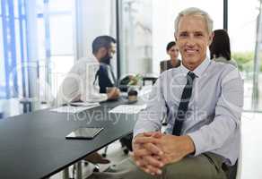 White collar business. Shot of corporate businesspeople in the office.