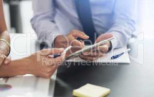 White collar business. Shot of corporate businesspeople in the office.