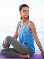 Building a strong mind and body. Shot of a young woman doing yoga.