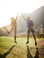Success depends on your backbone, not your wishbone. Shot of a sporty couple high-fiving after a run.