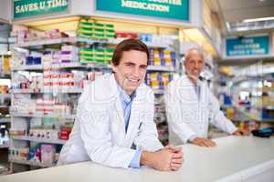Your one-stop pharmacy for all your health essentials. Portrait of two male pharmacists working in a chemist.