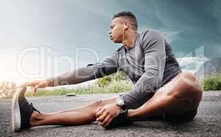 Your muscles need to wake up first. Shot of a sporty young man exercising outdoors.