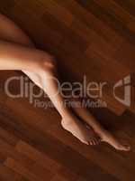 Luscious legs. High angle view of womans long toned legs.