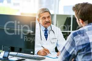 I need you to focus on these things that Ive listed. Shot of a confident mature male doctor consulting with a patient inside of his office during the day.
