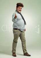 Nudge, nudge, wink, wink. Full length shot of an overweight man pointing at the camera.