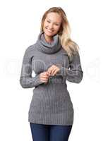 She can charm anyone with that smile. Young woman touching her hands and smiling sweetly at the camera - fashion.