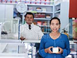 Ive gotten the correct meds with the right help. Shot of a male pharmacist and female customer in a pharmacy.