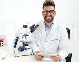 Advancing medical science and practice. Portrait of a male scientist working in a lab.