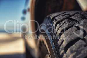 Ready for anything on the trail. Shot of a heavy duty 4x4 driving along some sand dunes.