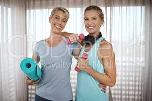 On a mission for a good time. Portrait of two mature women getting ready for their workout at home.