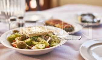 Indulge the healthy way. Shot of a delicious salad on a plate with no people.