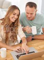 Our finances are in good order. Cropped shot of a couple doing their monthly budget at home.