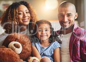 Family, the greatest gift of life. Portrait of a happy young family of three spending quality time together at home.