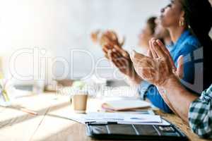 That was very helpful. Cropped shot of a group of businesspeople clapping hands.