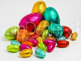 Easter edibles. Studio shot of a dazzling array of multicolored easter eggs wrapped in foil.