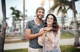 The ultimate summers date, a trip to the beach. Shot of a young couple spending a romantic day at the beach.