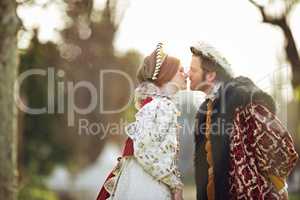 Her frog turned into a king. Shot of a royal couple spending time together at the gardens.