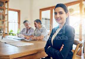 Here to help my clients to become smart investors. Portrait of a young consultant meeting with a mature couple at their home.