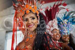 Jump in and join the festival. Shot of a group of cheerful young women wearing festive clothes while dancing to music inside of a club at night.