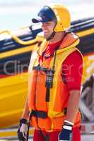 Sea rescue. A sea rescue worker and his speedboat.